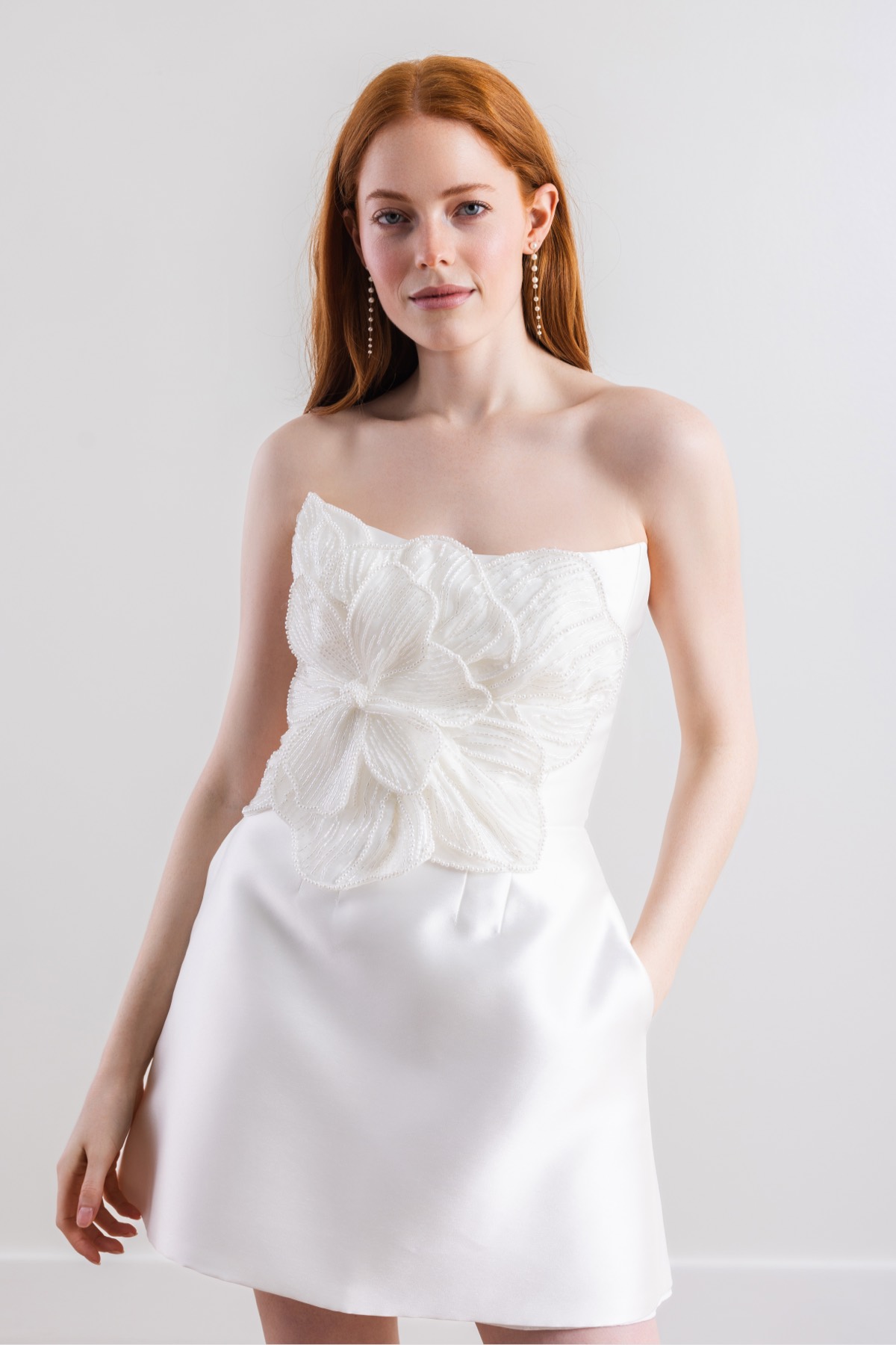 Little white dresses for the bride with 3D floral appliques and floral statement pieces | By Watters Little white dresses for the bride with 3D floral appliques and floral statement pieces | By Watters